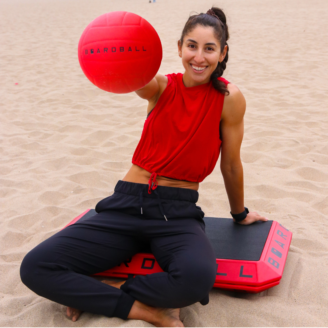 Team Canada Olympian and World beach champion Melissa Humana-Paredes playing boardball on the beach